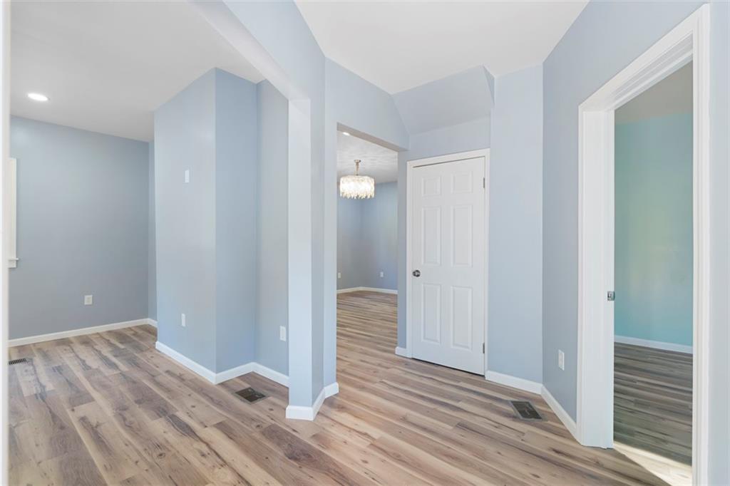 1105 Stock Street Pittsburgh, PA 15207 - Photo 16 of 37 a view of empty room with wooden floor