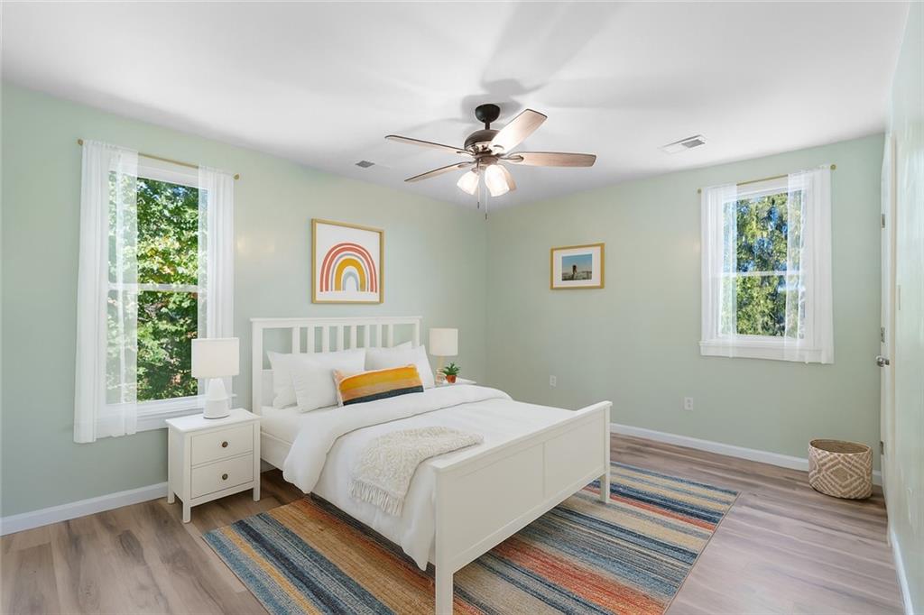 1105 Stock Street Pittsburgh, PA 15207 - Photo 26 of 37 a bedroom with a bed and a window
