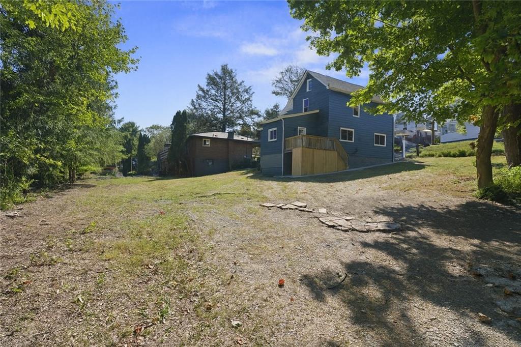 1105 Stock Street Pittsburgh, PA 15207 - Photo 35 of 37 a view of a house with a yard