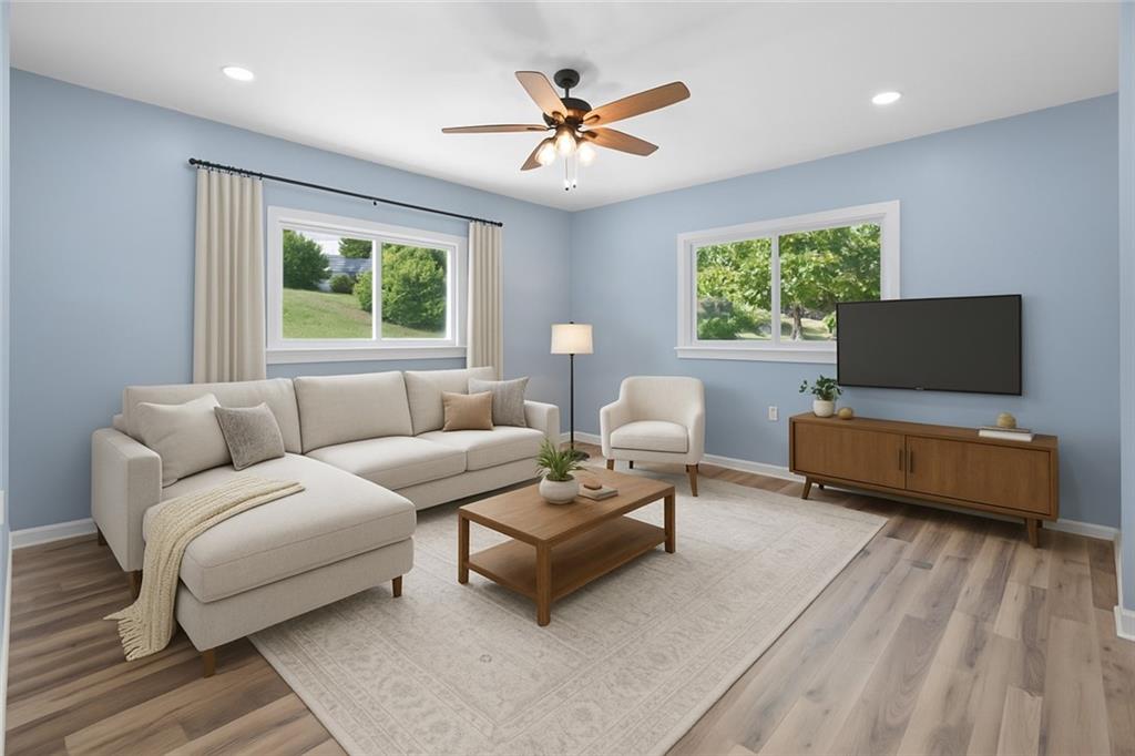 1105 Stock Street Pittsburgh, PA 15207 - Photo 6 of 37 a living room with furniture and a window