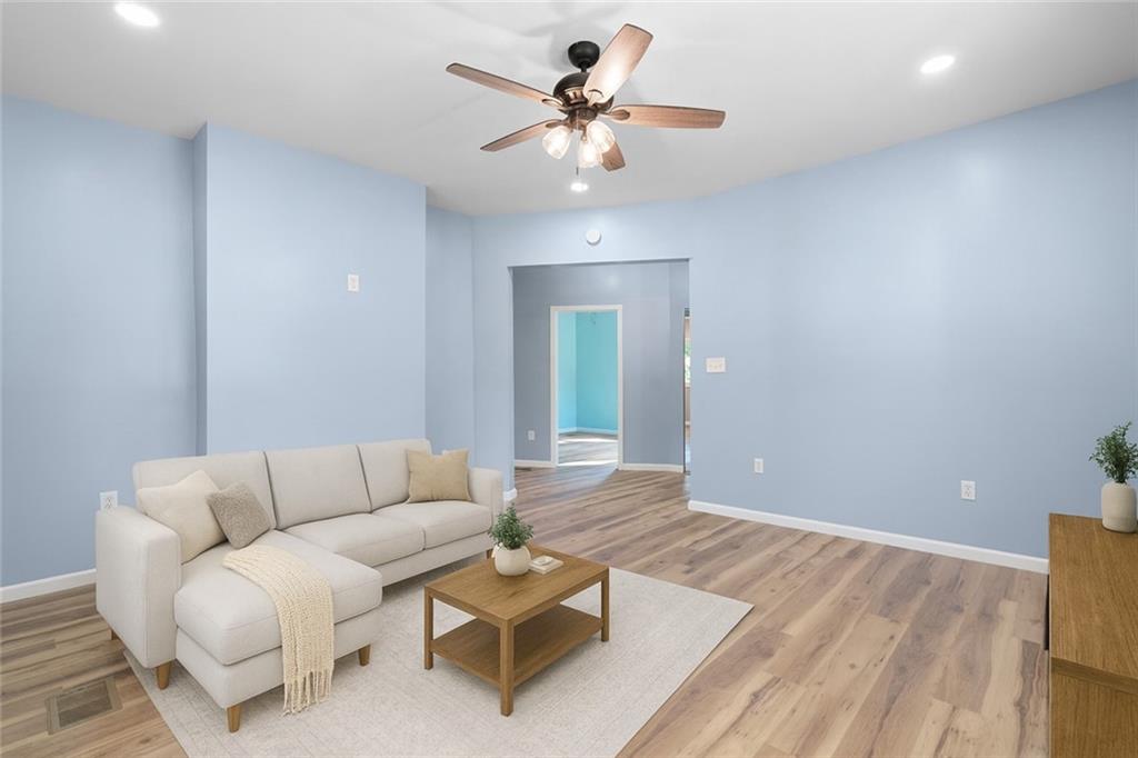 1105 Stock Street Pittsburgh, PA 15207 - Photo 7 of 37 a living room with furniture and a ceiling fan