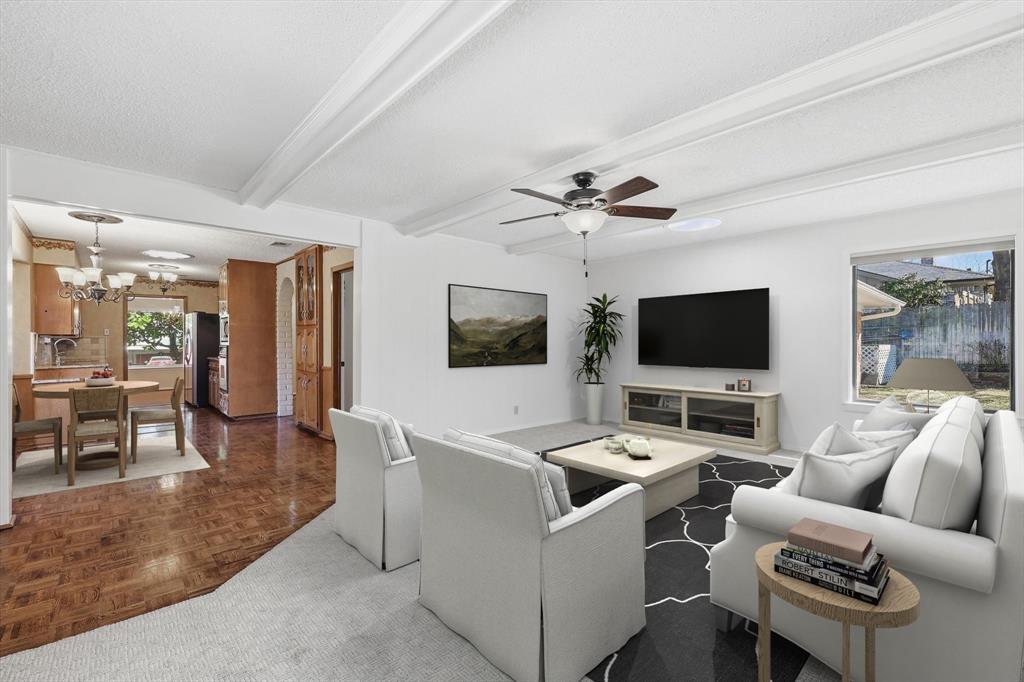 503 Summit Ridge Drive Euless, TX 76039 - Photo 17 of 38 a living room with furniture and a flat screen tv