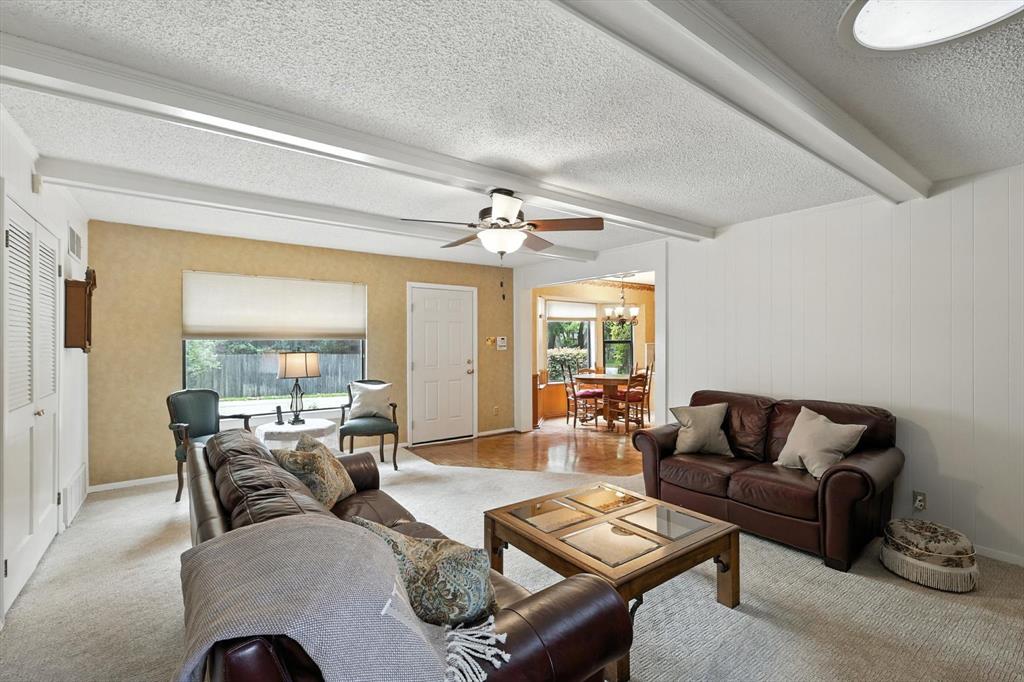 503 Summit Ridge Drive Euless, TX 76039 - Photo 18 of 40 a living room with furniture and a large window