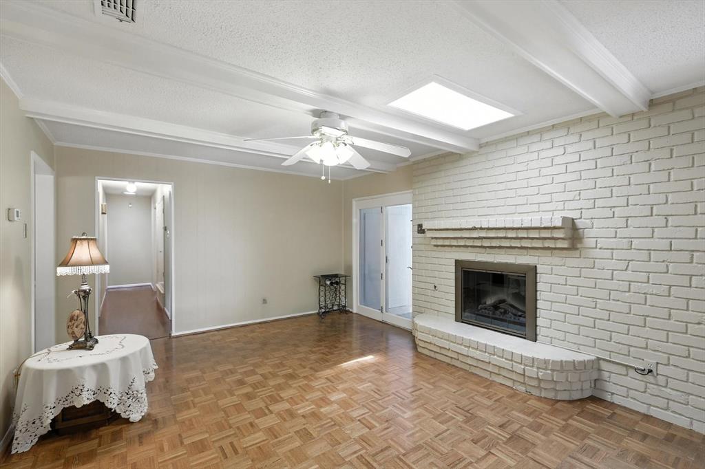 503 Summit Ridge Drive Euless, TX 76039 - Photo 22 of 40 a living room with furniture and a fireplace