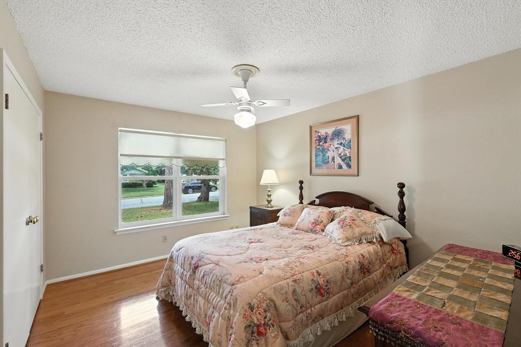 503 Summit Ridge Drive Euless, TX 76039 - Photo 28 of 38 a bedroom with a bed and a window