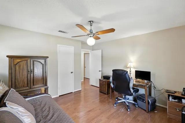 a view of a bathtub in a room next to a window