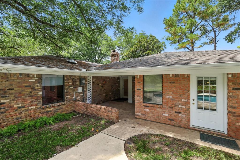 503 Summit Ridge Drive Euless, TX 76039 - Photo 35 of 40 front view of a house with a porch