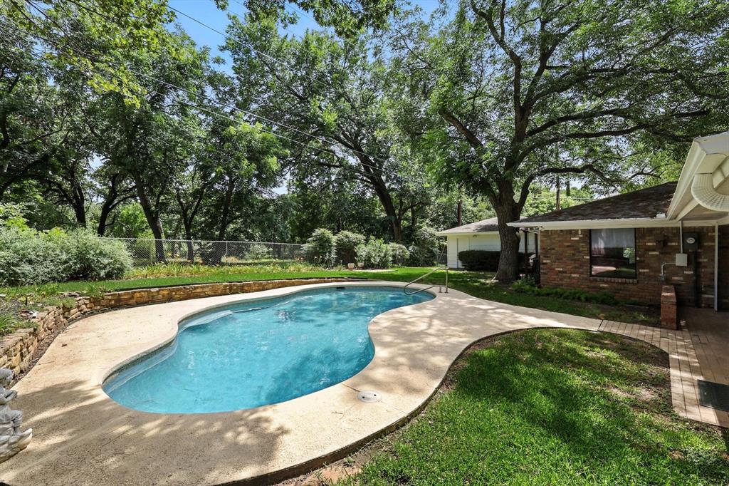 503 Summit Ridge Drive Euless, TX 76039 - Photo 36 of 40 a view of a house with a yard