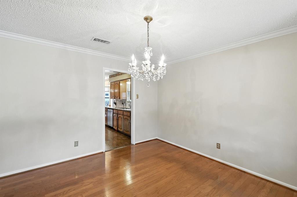 503 Summit Ridge Drive Euless, TX 76039 - Photo 7 of 40 a view of a chandelier in a room