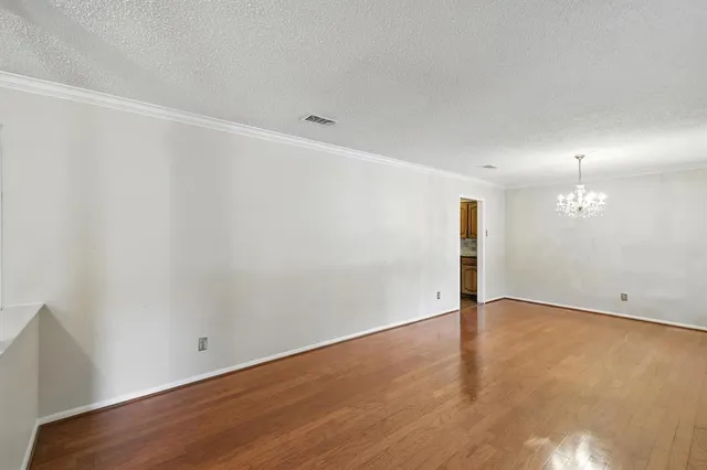 a kitchen with stainless steel appliances granite countertop sink stove and cabinets
