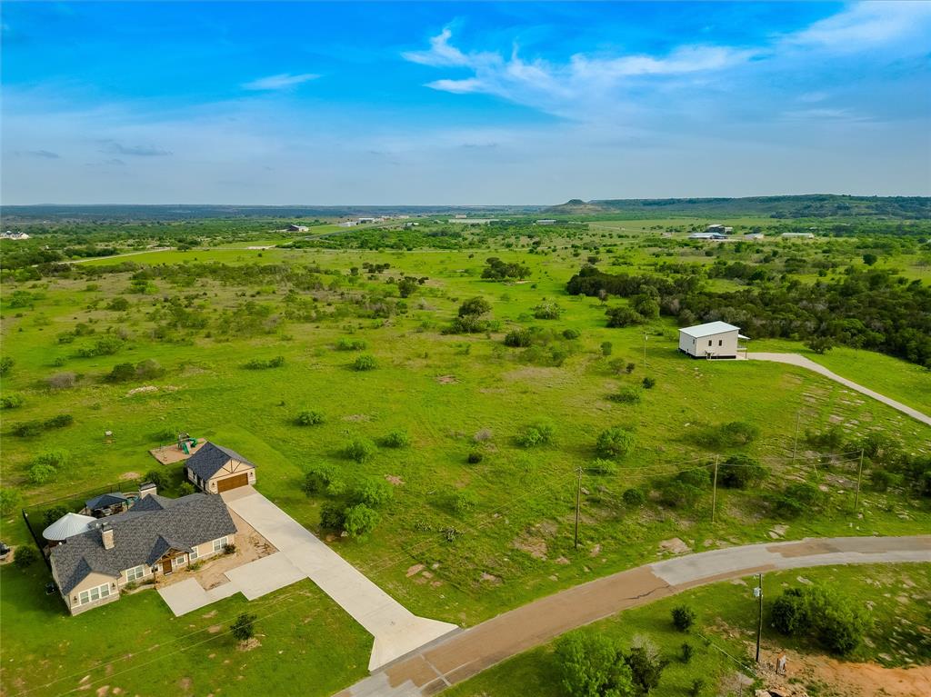 4-6 Hells Gate Loop Strawn, TX 76475 - Photo 4 of 13 a view of yard with ocean view