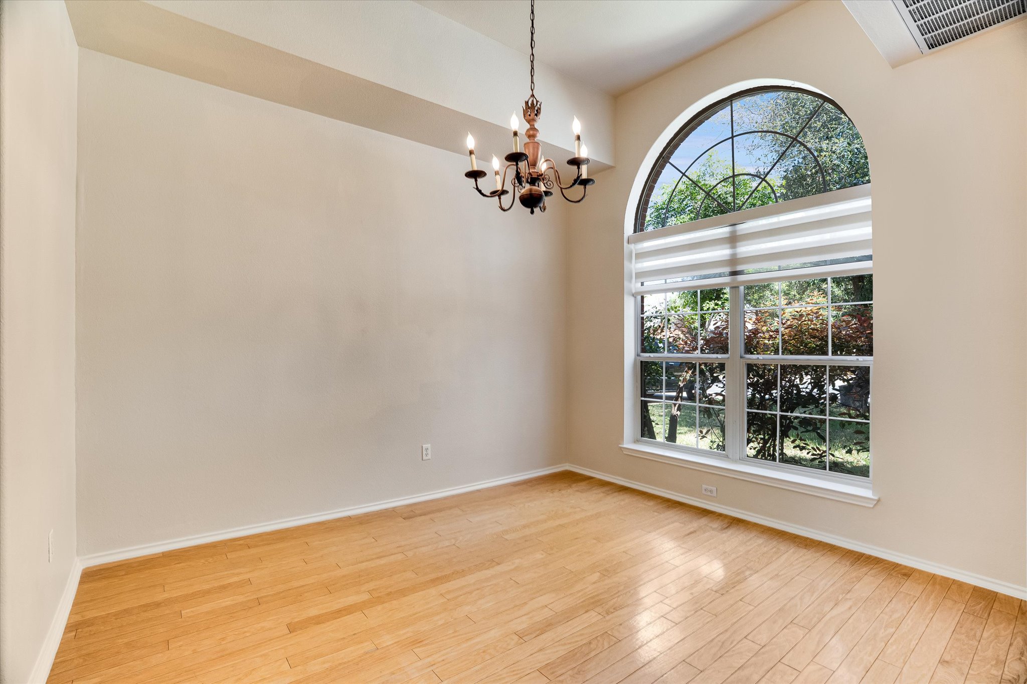 2207 Clover Ridge Drive Cedar Park, TX 78613 - Photo 11 of 25 Formal Dining Room with large window and wood floor