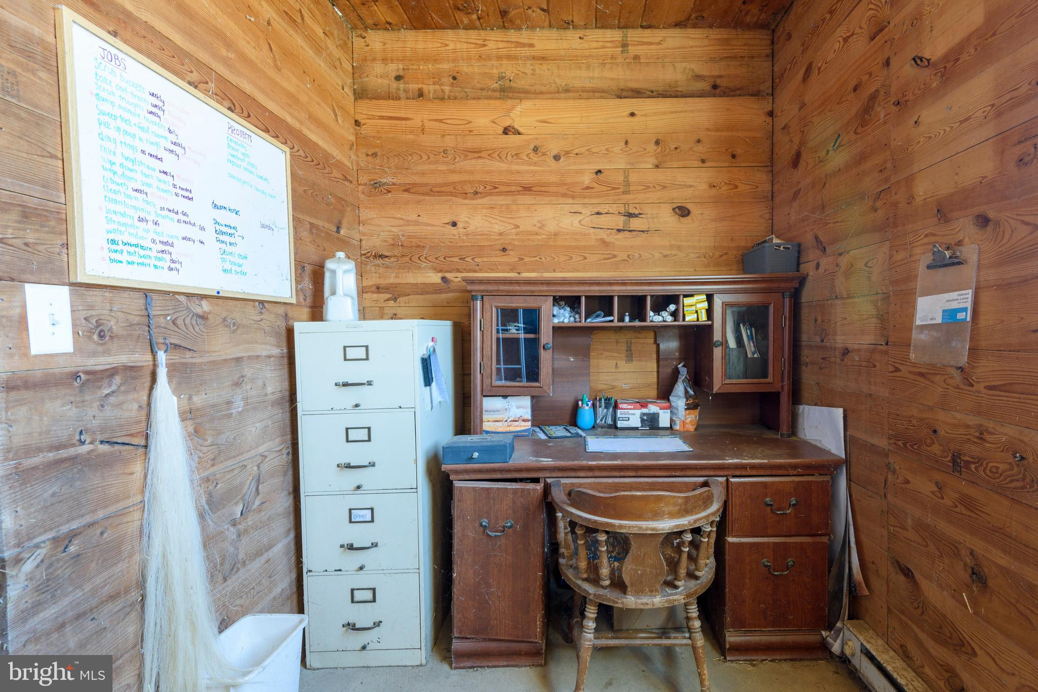 845 Waterway Road Oxford, PA 19363 - Photo 45 of 80 a table with chairs and a stove next to a window