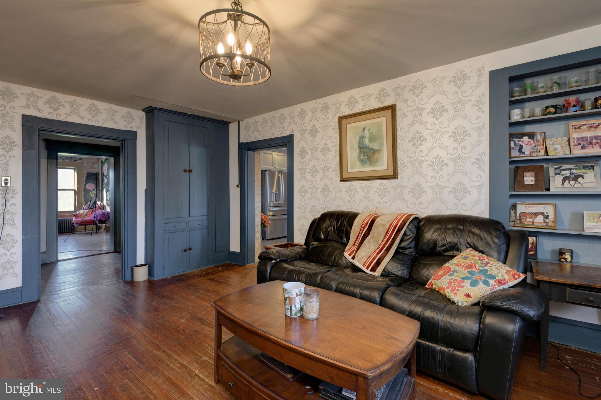 845 Waterway Road Oxford, PA 19363 - Photo 66 of 80 a living room with furniture and wooden floor