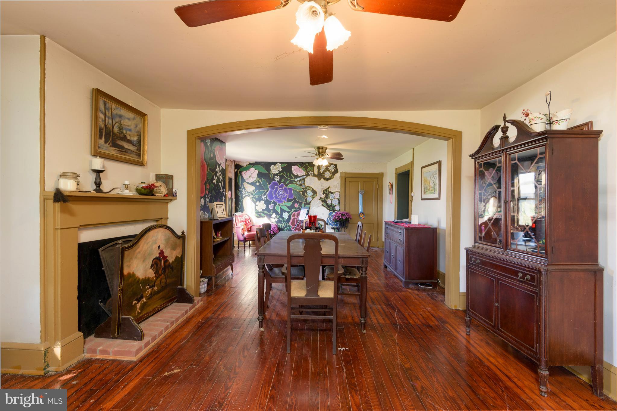 845 Waterway Road Oxford, PA 19363 - Photo 67 of 80 a view of a livingroom with furniture a fireplace and wooden floor