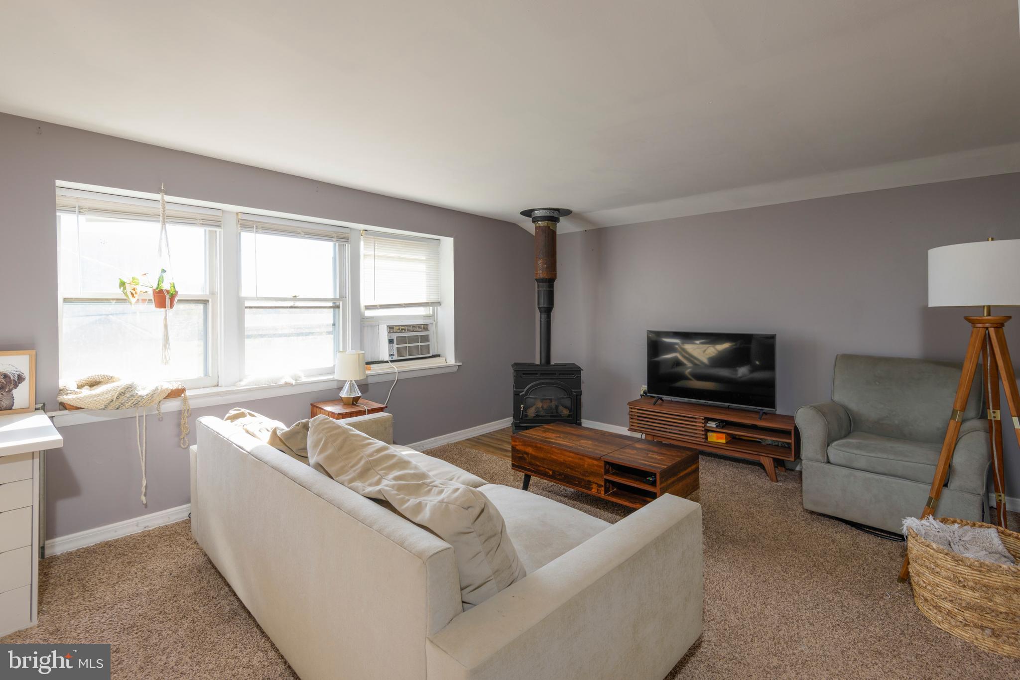 845 Waterway Road Oxford, PA 19363 - Photo 79 of 80 a living room with furniture and a flat screen tv