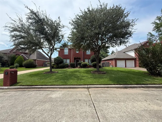 a view of a yard in front of a house