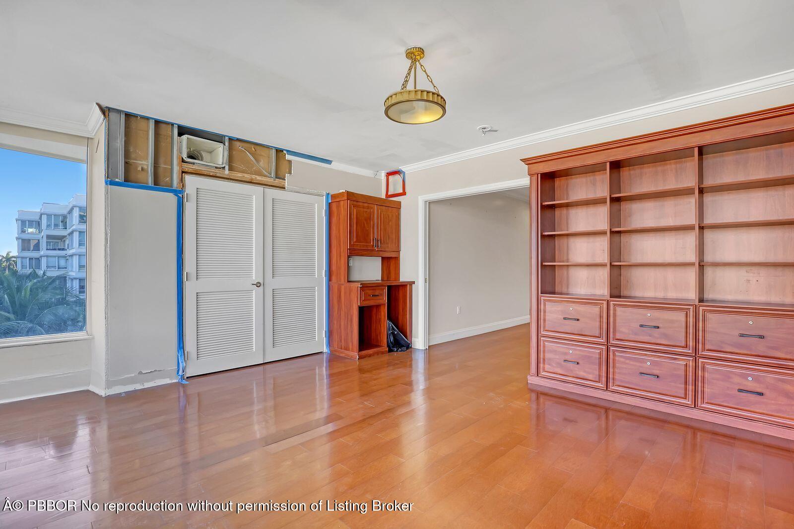 44 Cocoanut Row, Unit 420/421 A Palm Beach, FL 33480 - Photo 14 of 24 a view of empty room with cabinet and window