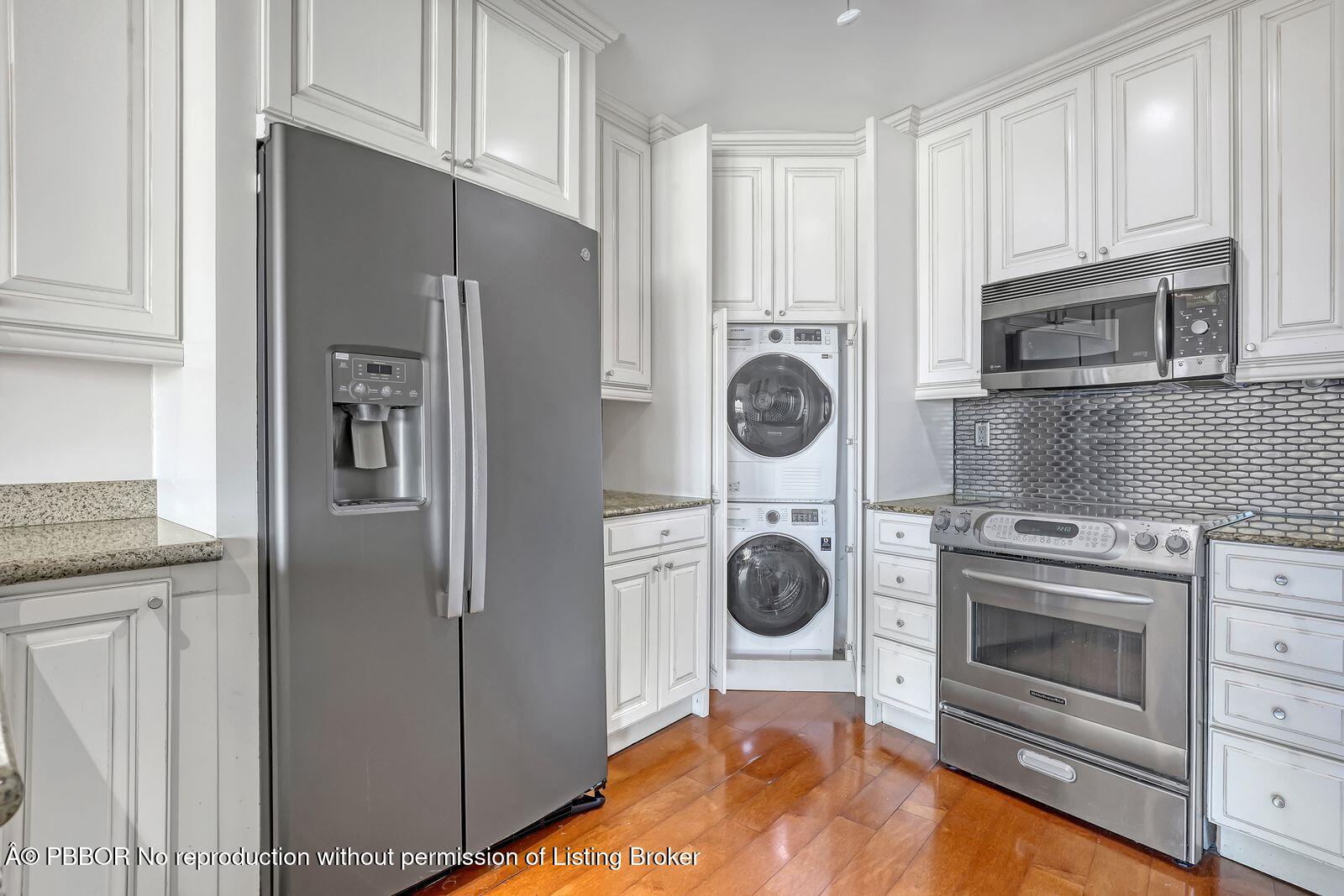 44 Cocoanut Row, Unit 420/421 A Palm Beach, FL 33480 - Photo 4 of 24 a kitchen with refrigerator a stove and a refrigerator