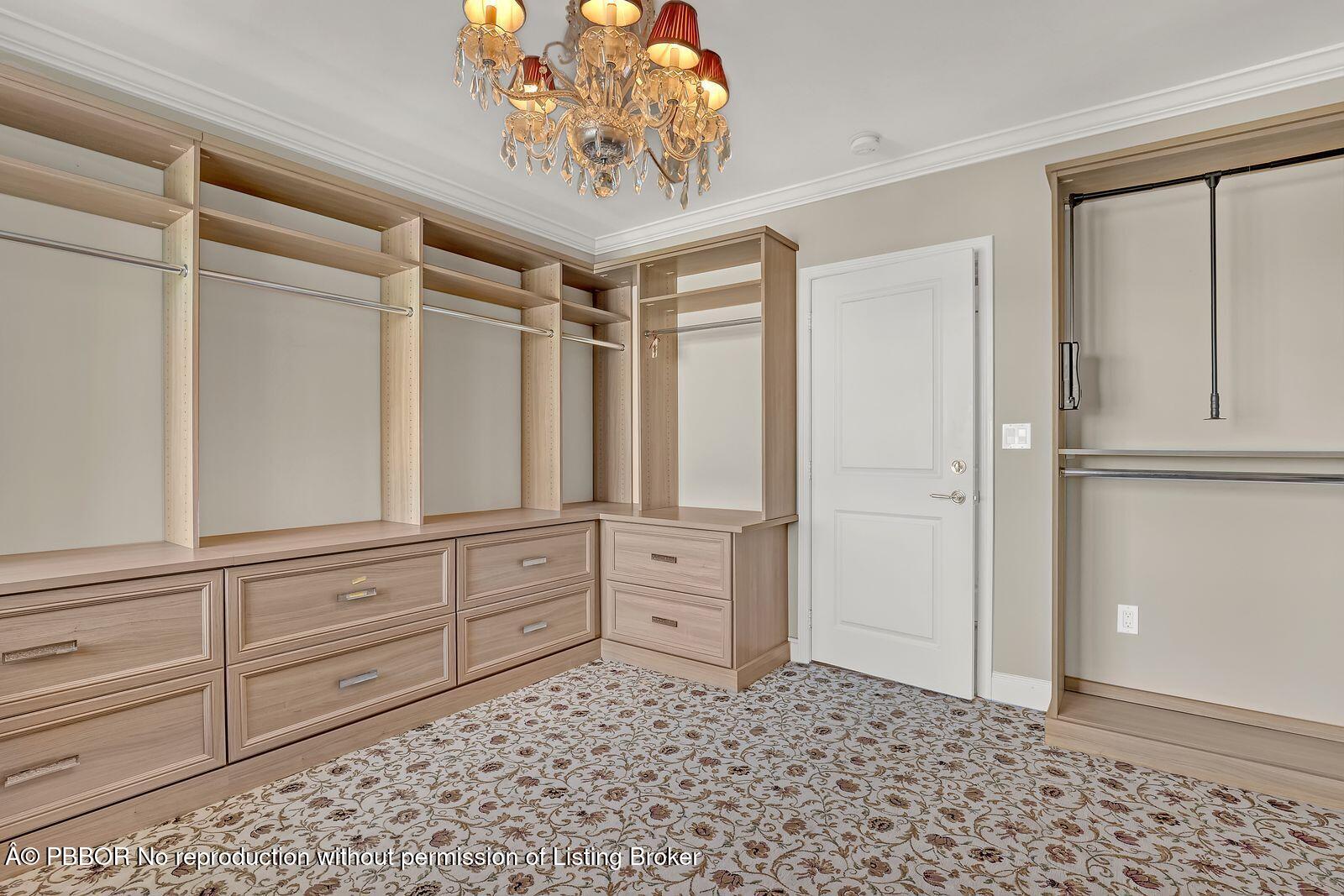 44 Cocoanut Row, Unit 420/421 A Palm Beach, FL 33480 - Photo 7 of 24 a view of a entryway with cabinet