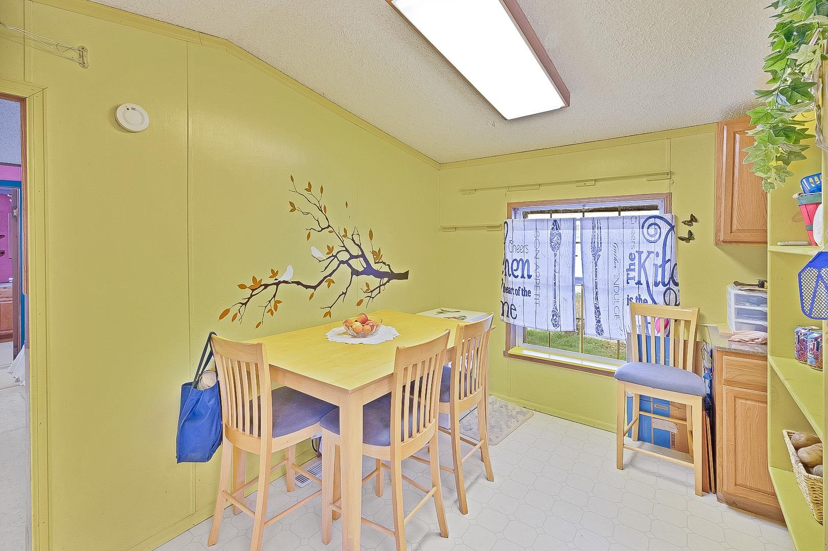 424 32 Road, Unit 271 Clifton, CO 81520 - Photo 14 of 29 a view of a dining room with furniture and wooden floor