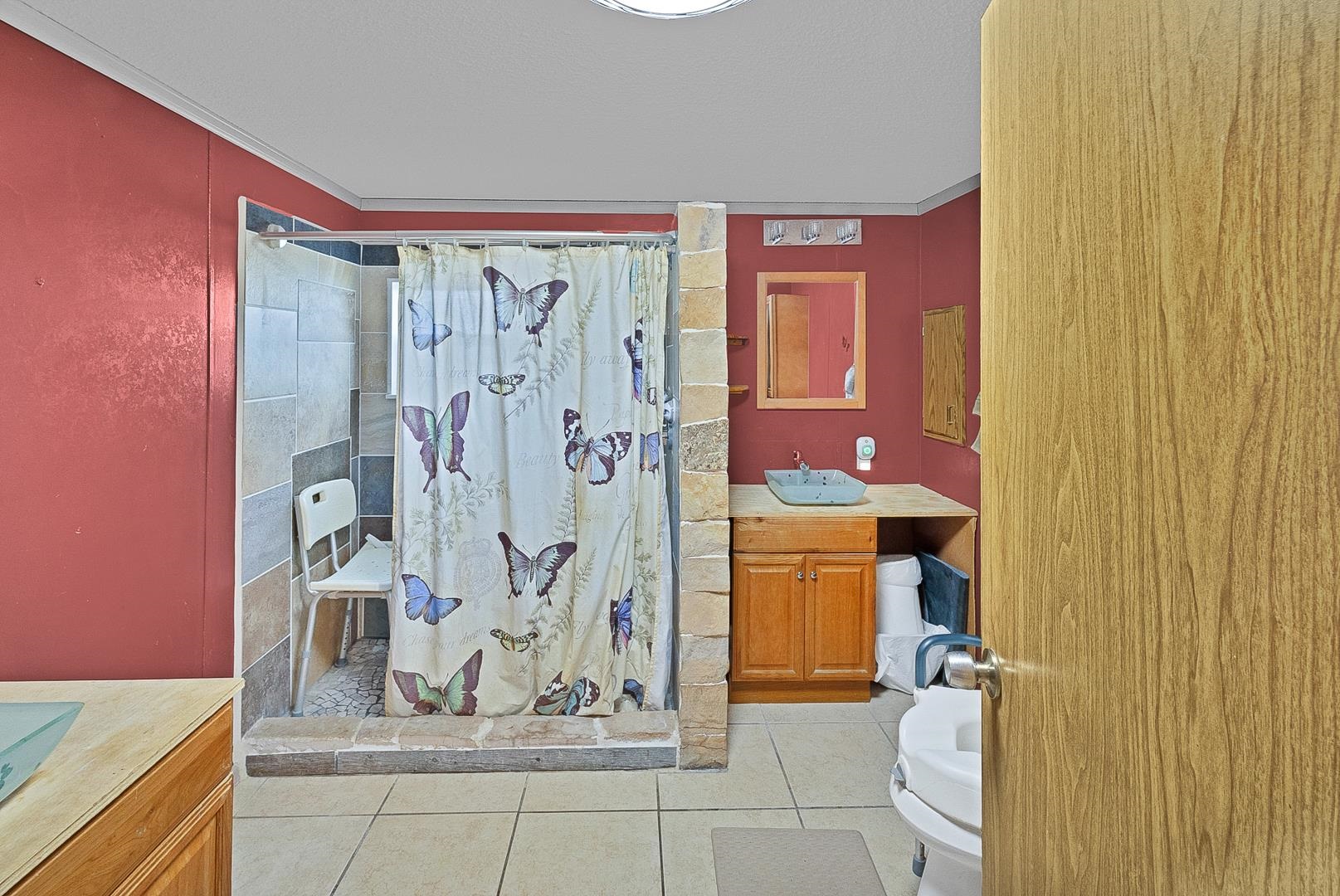 424 32 Road, Unit 271 Clifton, CO 81520 - Photo 18 of 29 a bathroom with a shower curtain and a sink