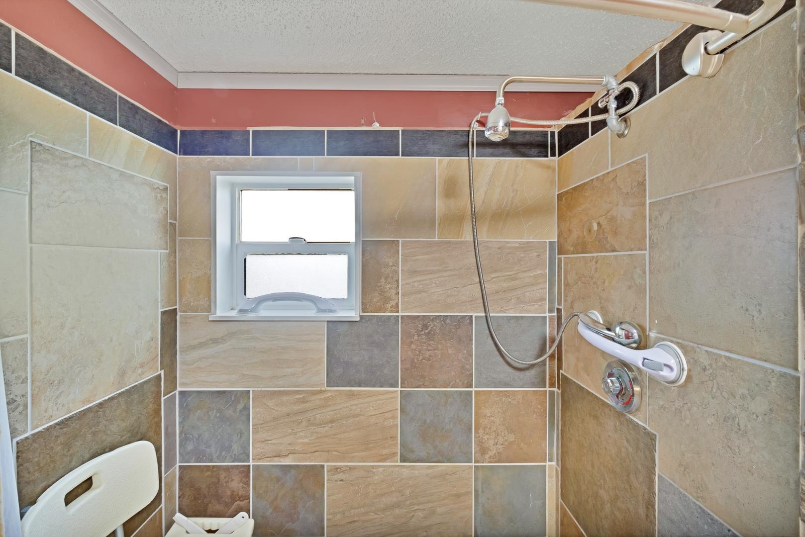424 32 Road, Unit 271 Clifton, CO 81520 - Photo 19 of 29 a bathroom with a window and a shower