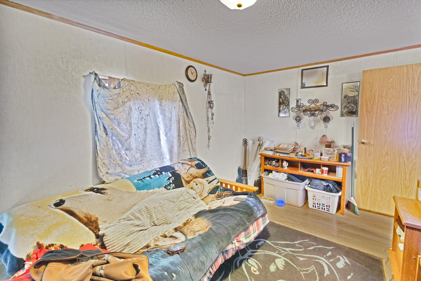 424 32 Road, Unit 271 Clifton, CO 81520 - Photo 25 of 29 a bedroom with a bed and a table in it