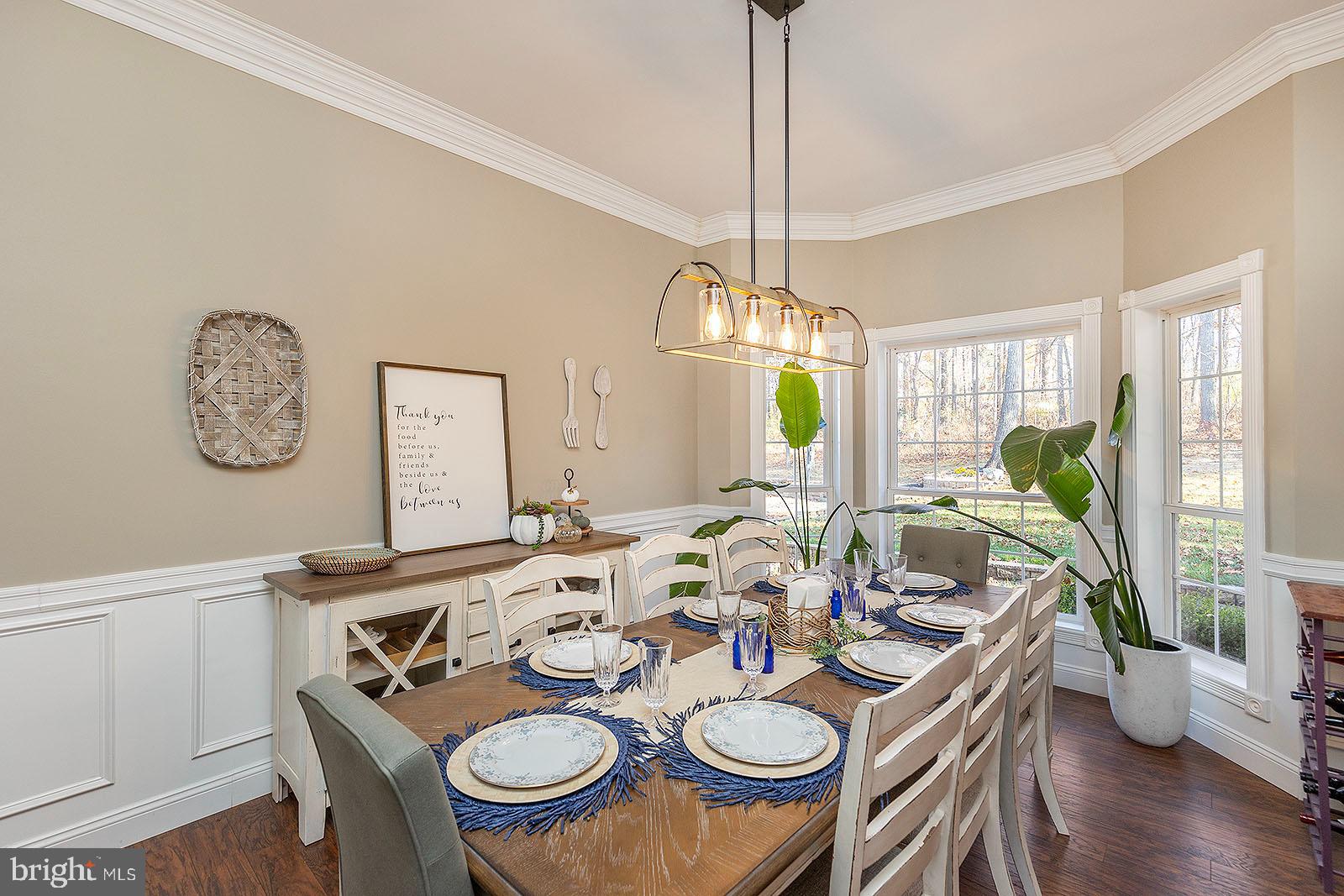 141 Old Baltimore Road Winchester, VA 22603 - Photo 13 of 87 Dining room with chair rail & crown molding