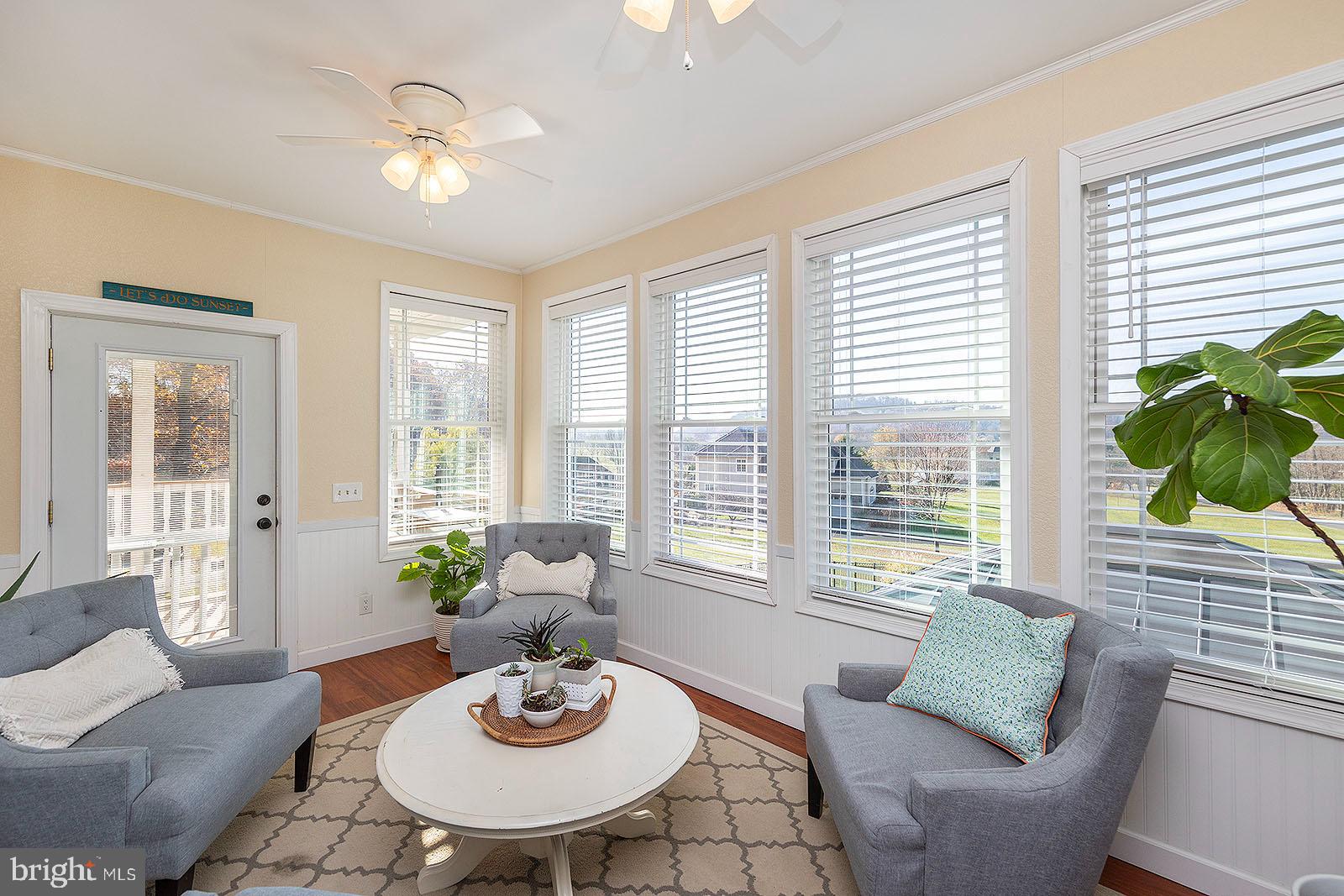 141 Old Baltimore Road Winchester, VA 22603 - Photo 32 of 87 Sunroom with crown molding & wainscoting