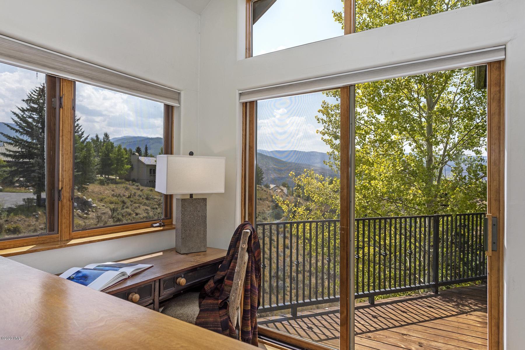 1581 Winslow Road, Unit A Edwards, CO 81632 - Photo 11 of 27 a view of a balcony with chair and wooden floor