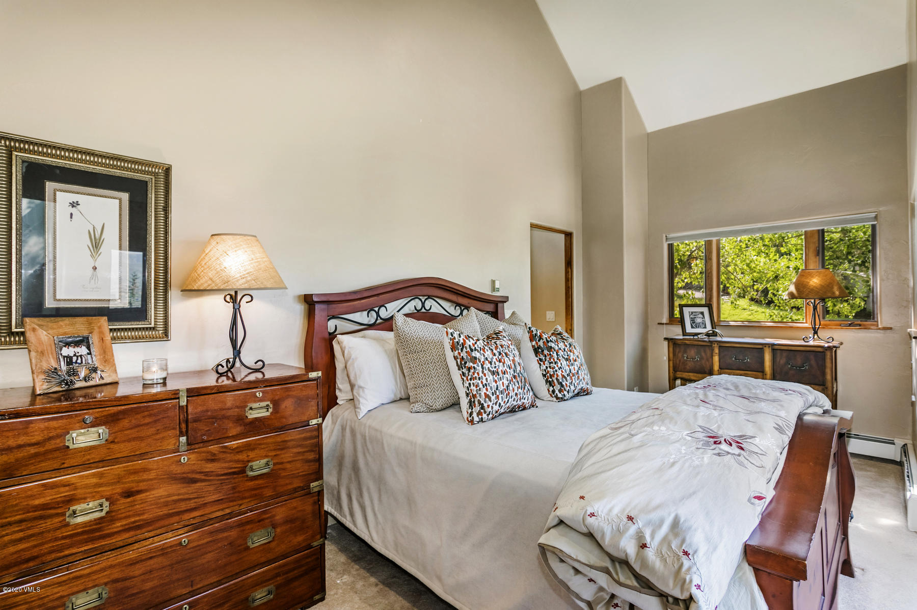 1581 Winslow Road, Unit A Edwards, CO 81632 - Photo 12 of 27 a bedroom with a bed and a lamp