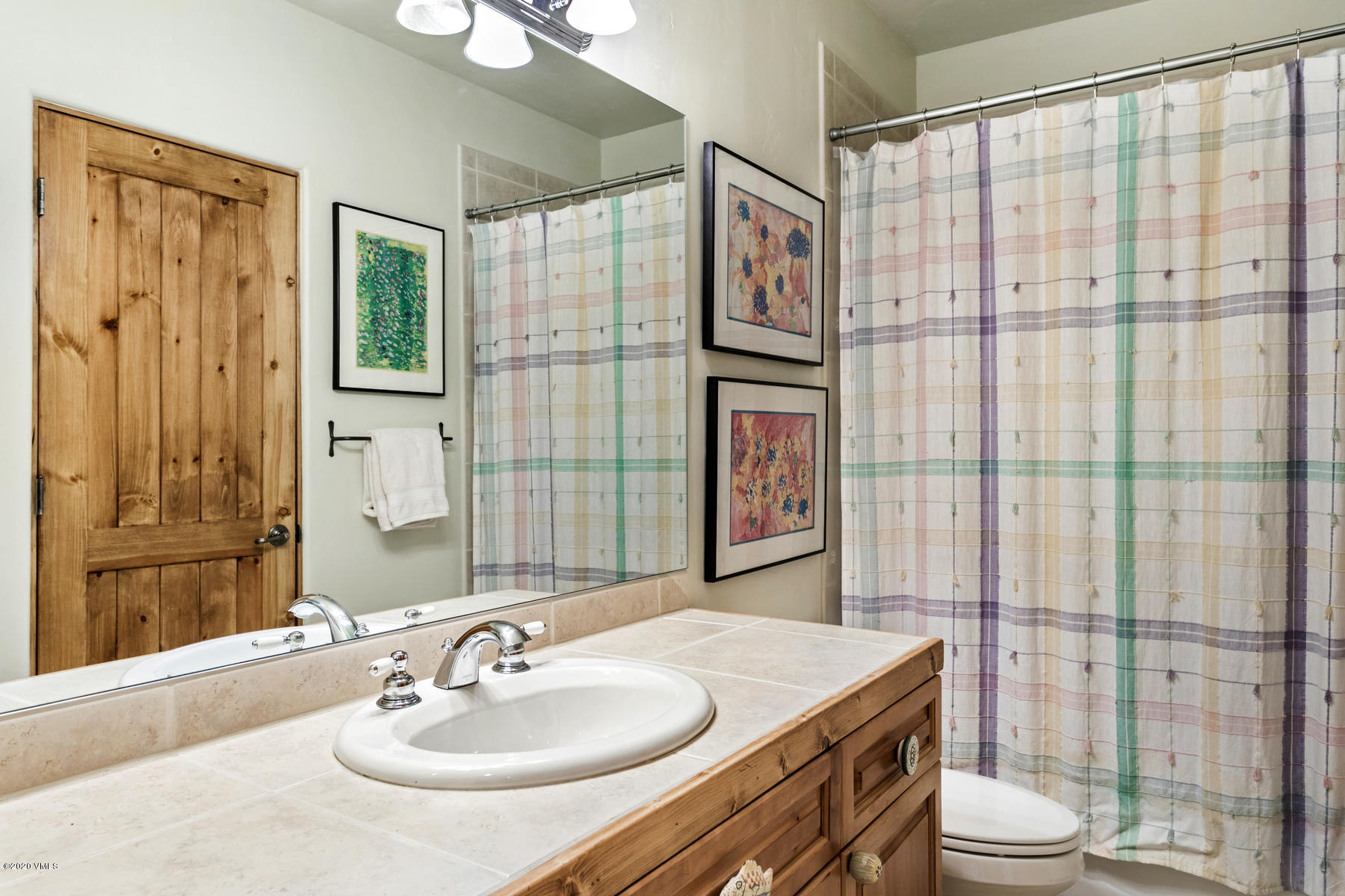 1581 Winslow Road, Unit A Edwards, CO 81632 - Photo 19 of 27 a bathroom with a sink toilet and shower