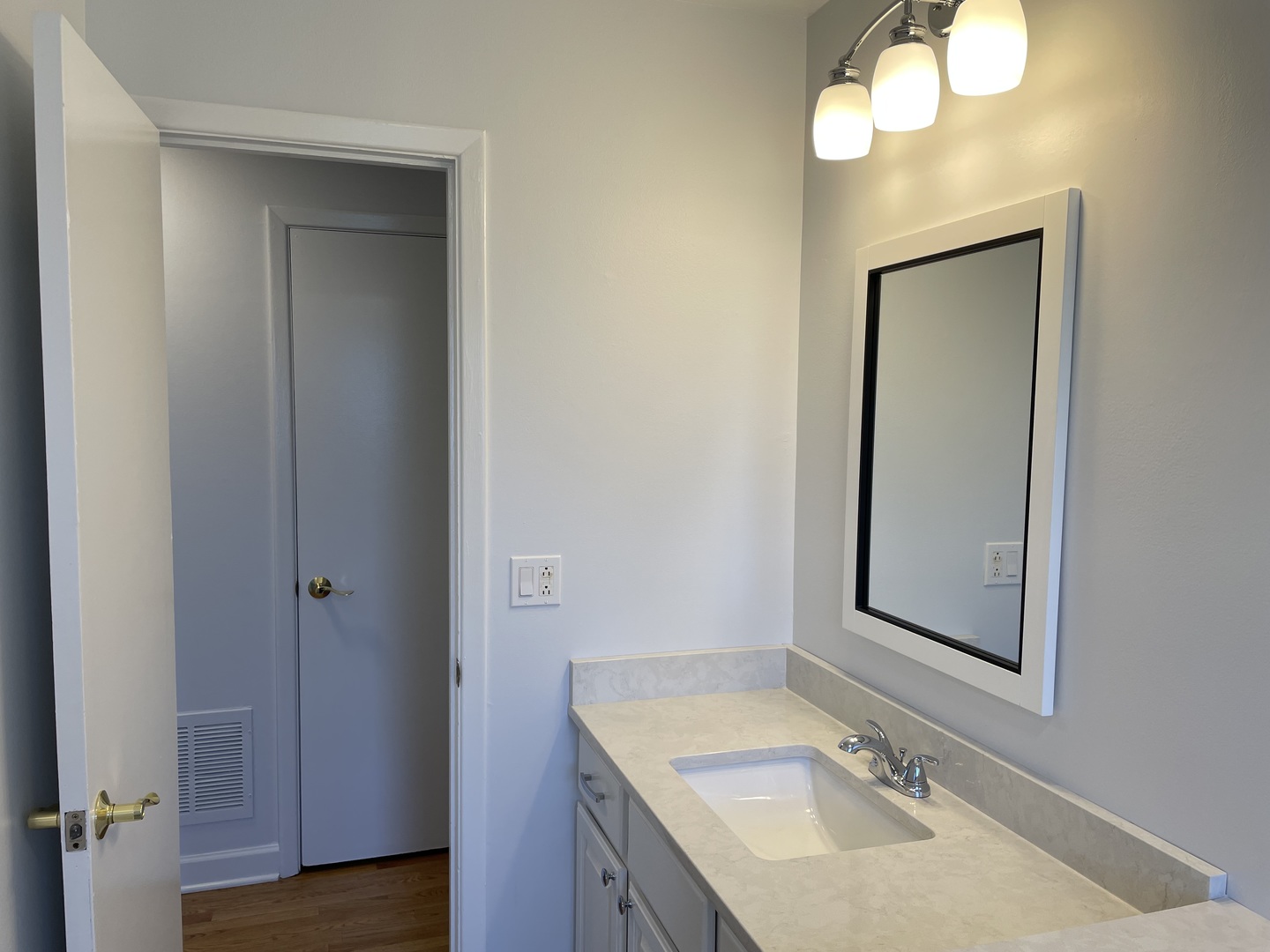 449 Yarmouth Road Elk Grove Village, IL 60007 - Photo 18 of 48 a bathroom with a sink vanity and mirror