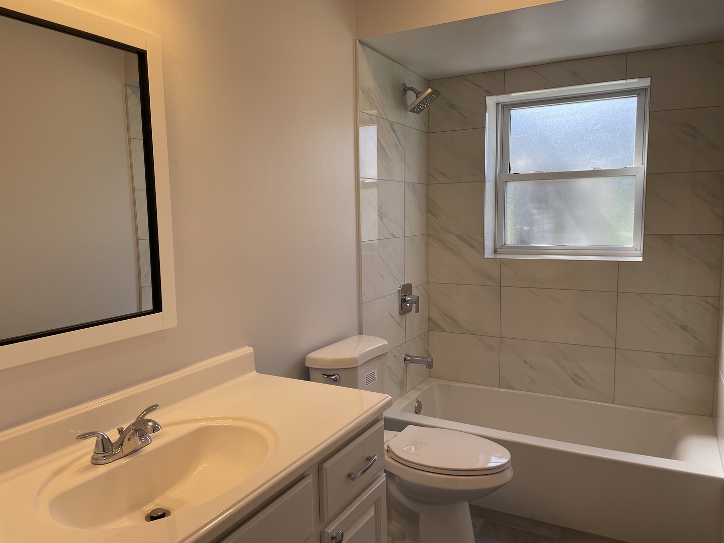 449 Yarmouth Road Elk Grove Village, IL 60007 - Photo 26 of 48 a bathroom with a sink toilet and shower