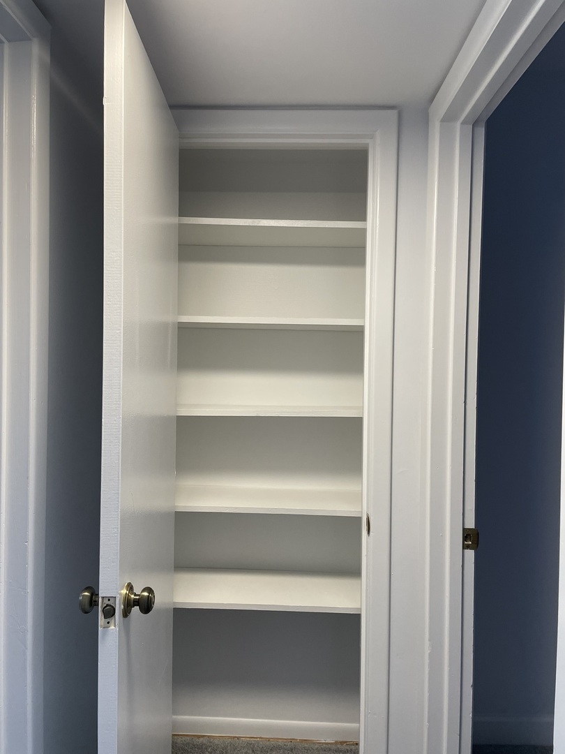 449 Yarmouth Road Elk Grove Village, IL 60007 - Photo 32 of 48 a view of walk in closet with empty racks