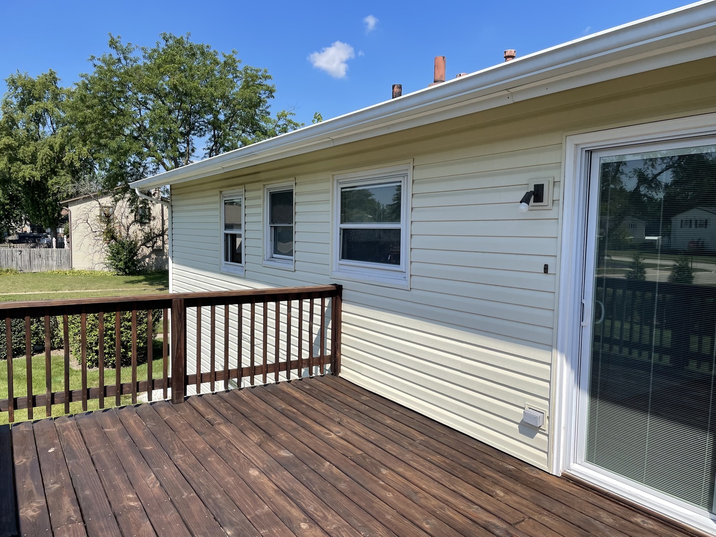 449 Yarmouth Road Elk Grove Village, IL 60007 - Photo 41 of 48 a view of a wooden deck with a yard