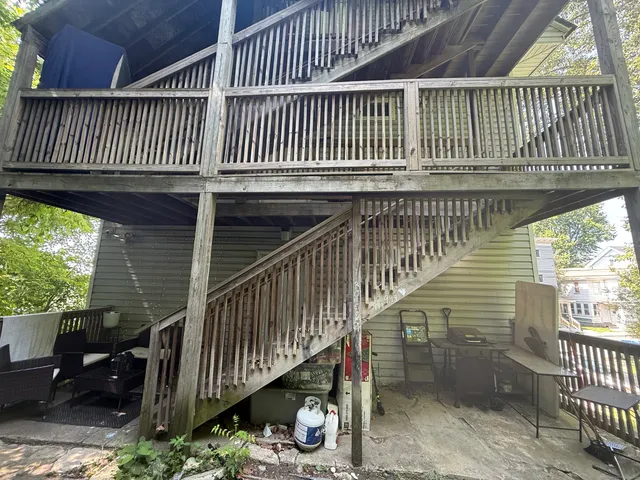 a view of a balcony with a swing