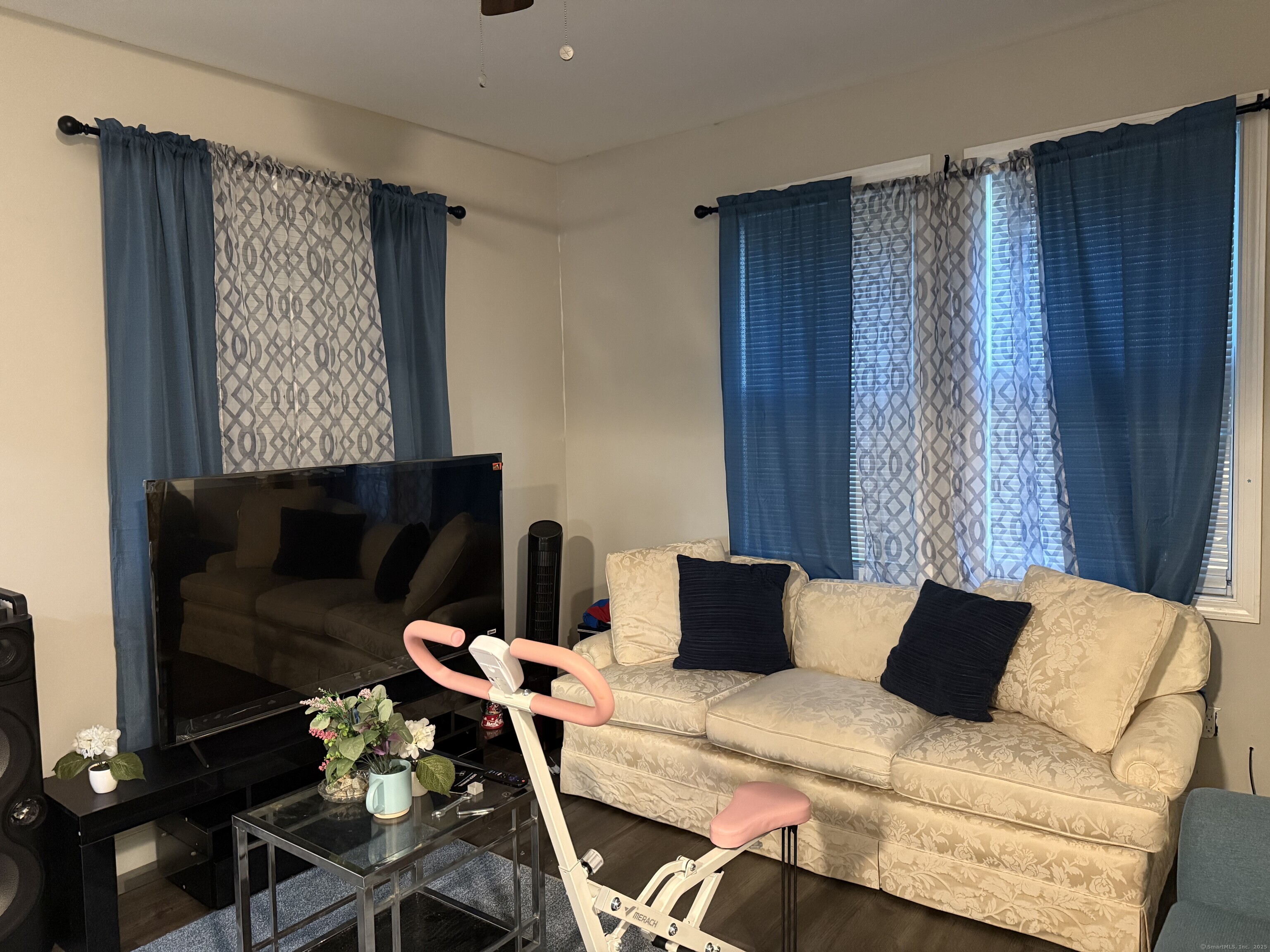 210 Bishop Street Waterbury, CT 06704 - Photo 7 of 9 a bedroom with a bed and furniture