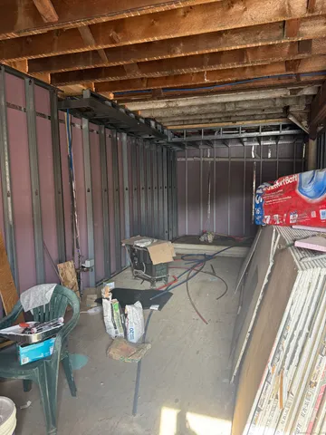 a kitchen with stainless steel appliances granite countertop a refrigerator sink and stove