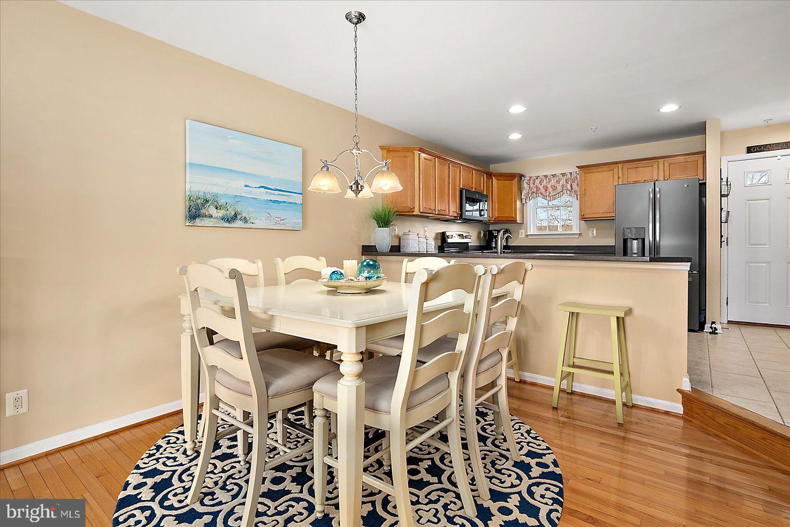 617 Salt Spray Road, Unit D Ocean City, MD 21842 - Photo 16 of 69 a view of a dining room with furniture
