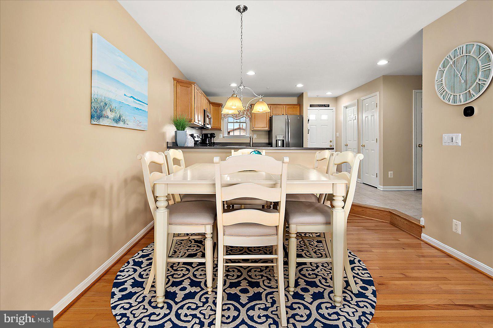 617 Salt Spray Road, Unit D Ocean City, MD 21842 - Photo 17 of 69 a view of a dining room with furniture