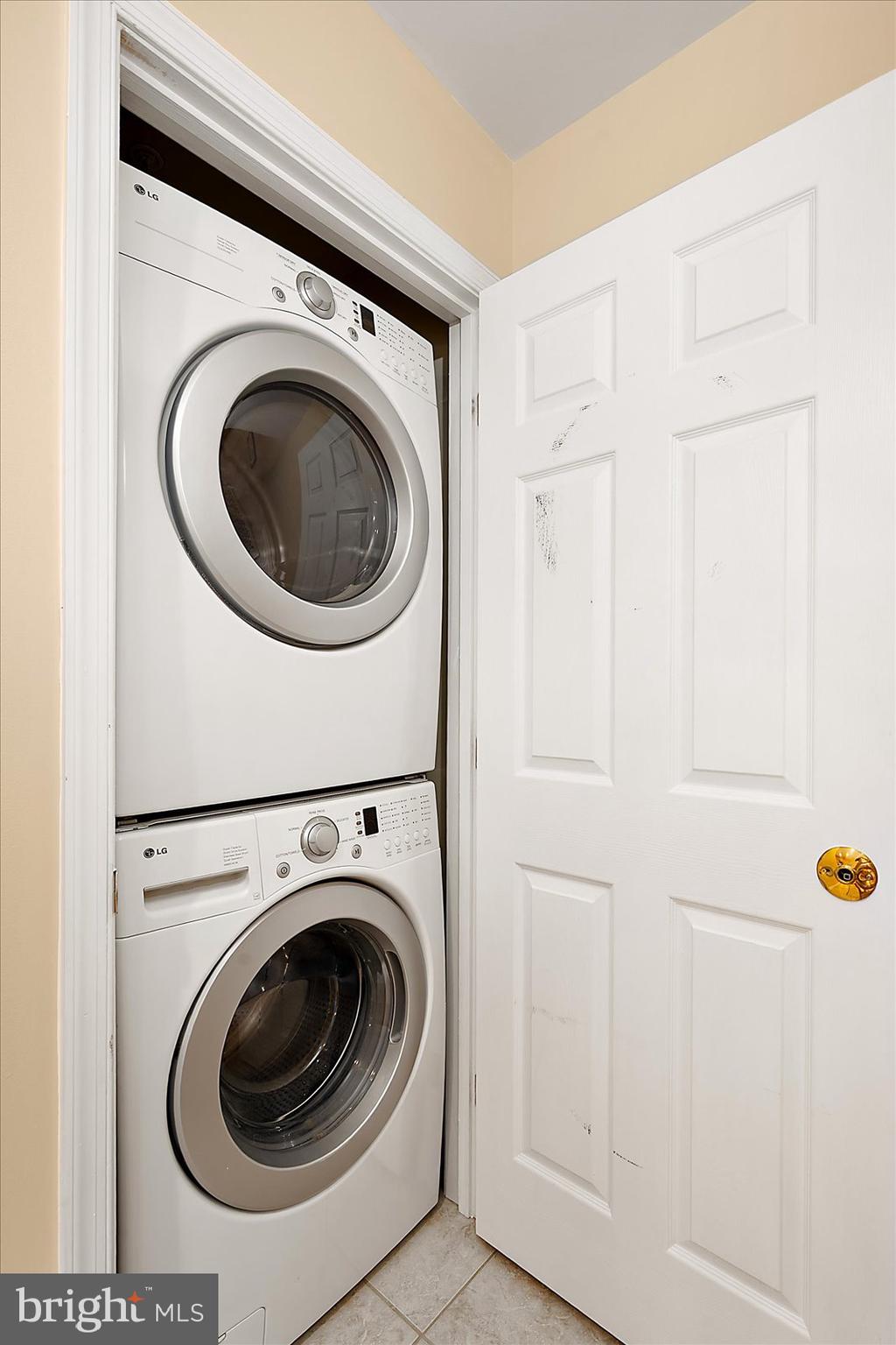 617 Salt Spray Road, Unit D Ocean City, MD 21842 - Photo 39 of 69 a utility room with dryer and washer