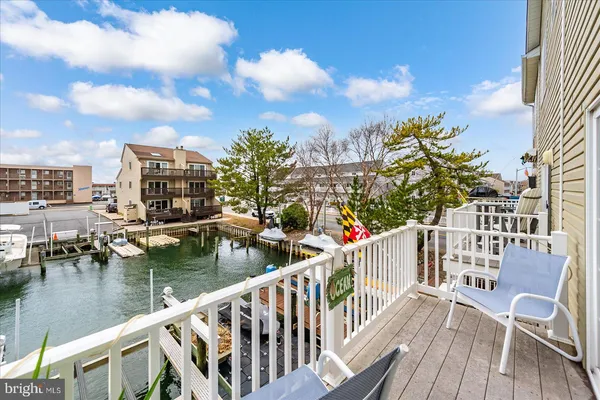 a view of a swimming pool with a lounge chairs
