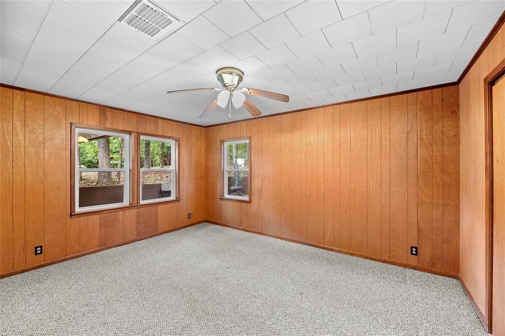 998 County Road 3230 Quitman, TX 75783 - Photo 21 of 24 an empty room with windows