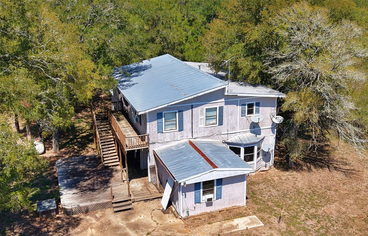 2035 Jeddo Road Rosanky, TX 78953 - Photo 6 of 15 a roof deck with a table and chairs