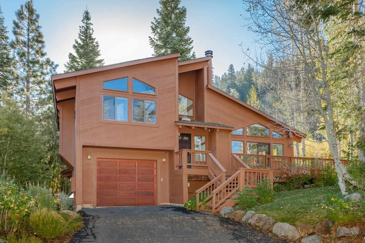1311 Pine Trail Alpine Meadows, CA 96146 - Photo 1 of 14 a front view of a house with garden
