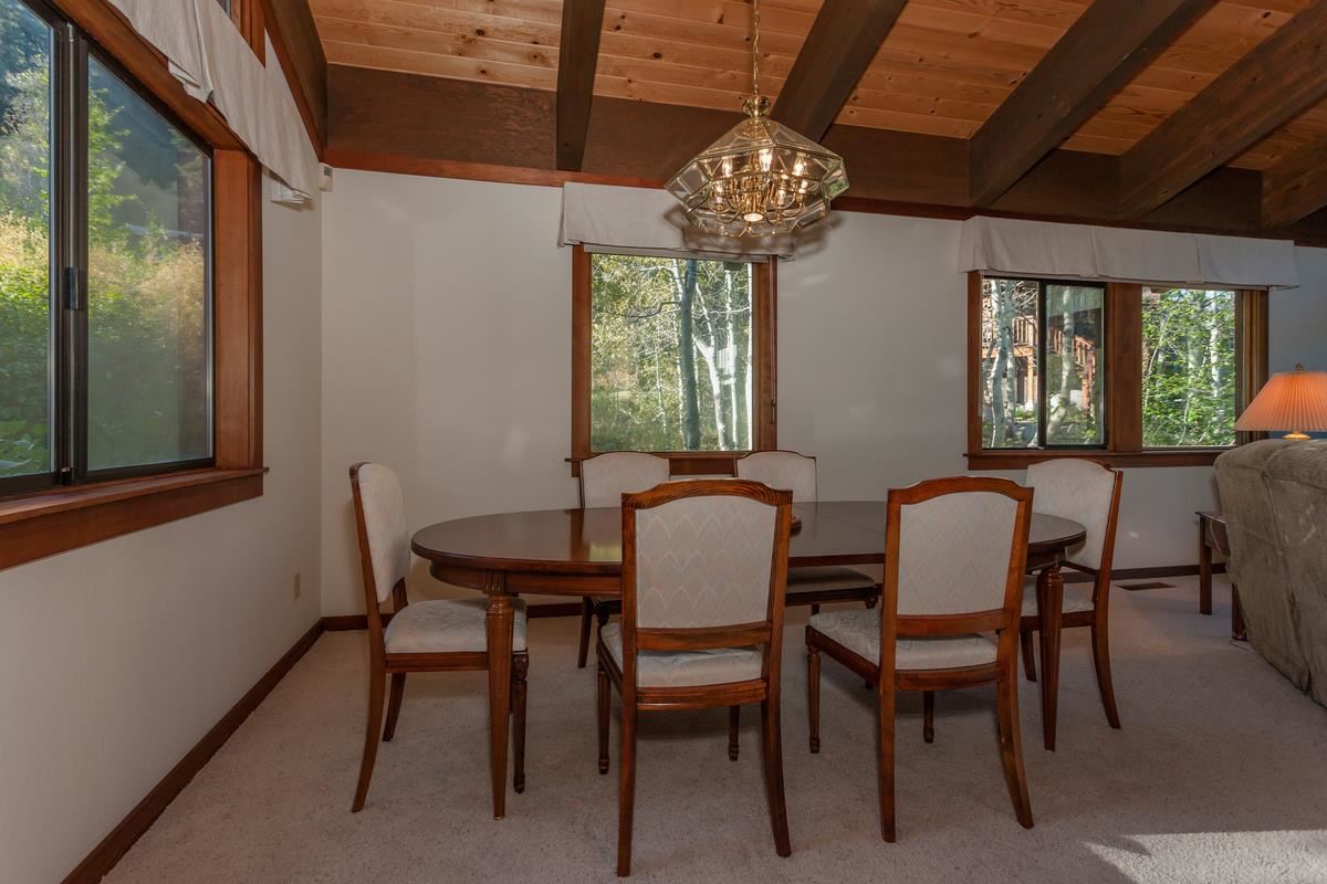 1311 Pine Trail Alpine Meadows, CA 96146 - Photo 6 of 14 a view of a dining room with furniture window and outside view