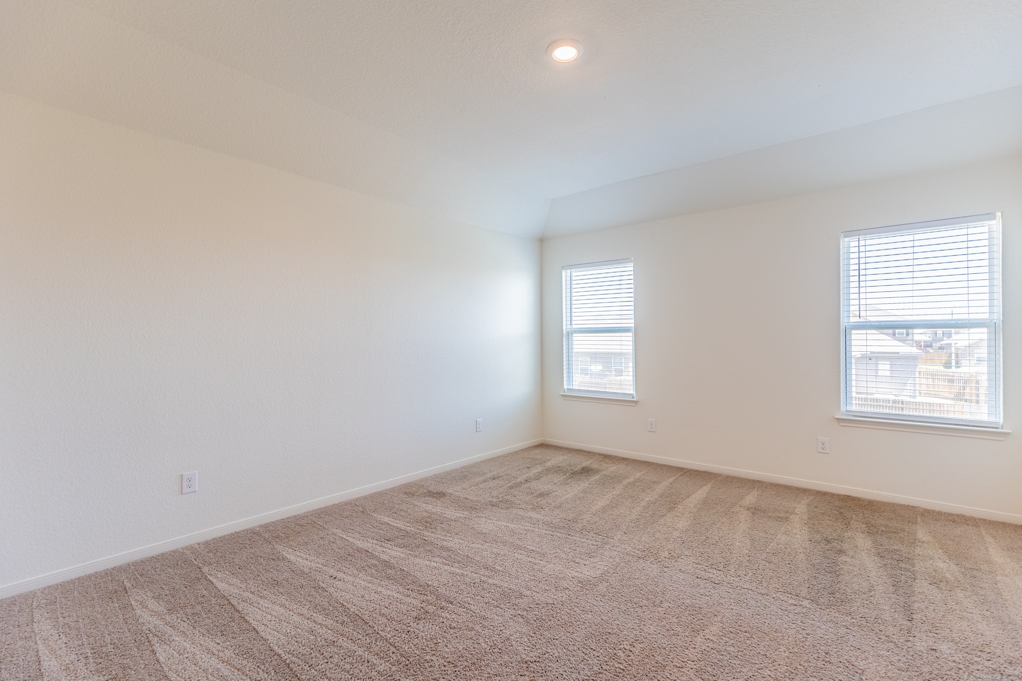 18628 Quiet Range Drive Elgin, TX 78621 - Photo 13 of 32 an empty room with a window