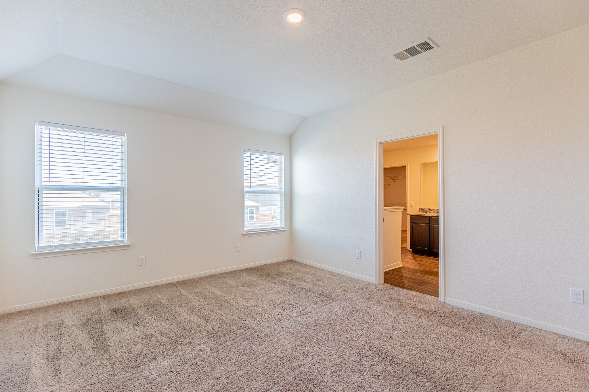 18628 Quiet Range Drive Elgin, TX 78621 - Photo 14 of 32 a view of an empty room with a window
